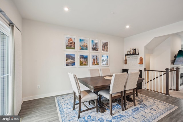 dining area with recessed lighting, wood finished floors, and baseboards