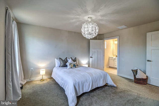 bedroom with visible vents, baseboards, a notable chandelier, light colored carpet, and connected bathroom