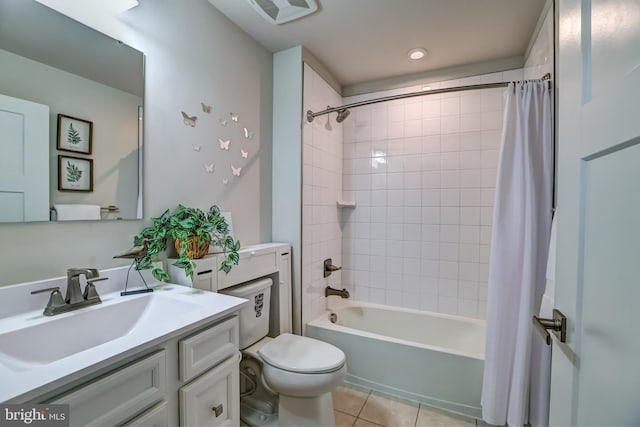 bathroom featuring tile patterned flooring, visible vents, toilet, shower / bath combination with curtain, and vanity