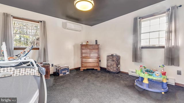 bedroom with baseboards, dark carpet, and a wall unit AC