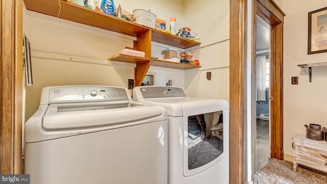 laundry area featuring washer and dryer and laundry area