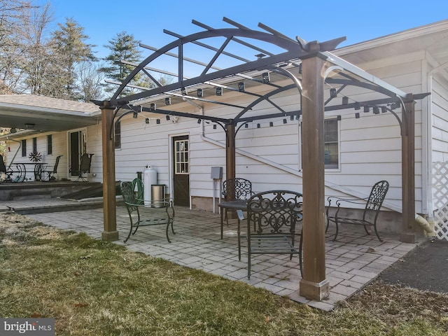 view of patio / terrace featuring a pergola