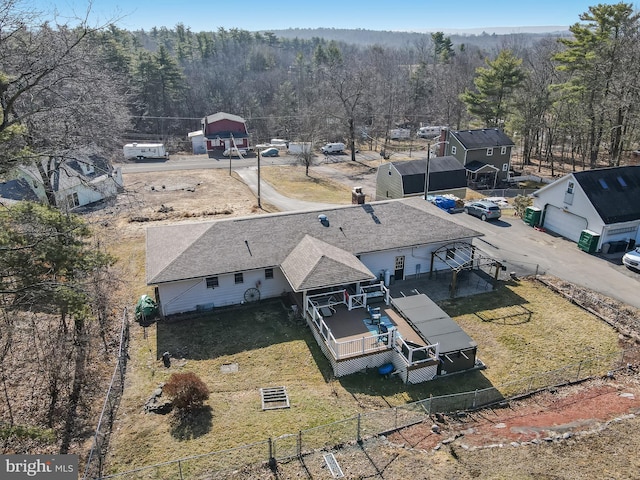 drone / aerial view with a view of trees