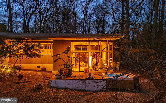 back of property with crawl space