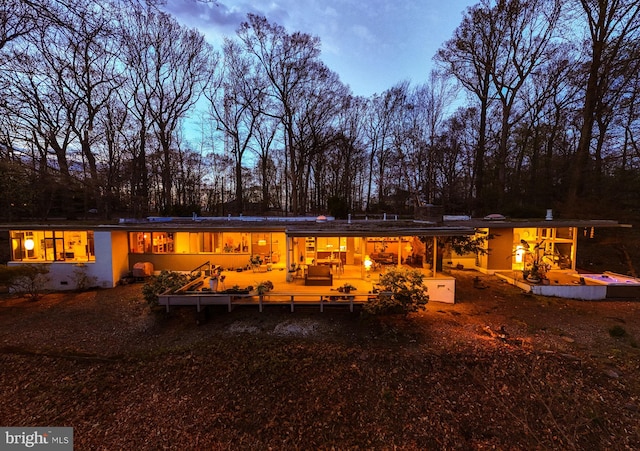 rear view of house featuring a patio