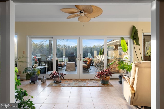sunroom with a healthy amount of sunlight and french doors