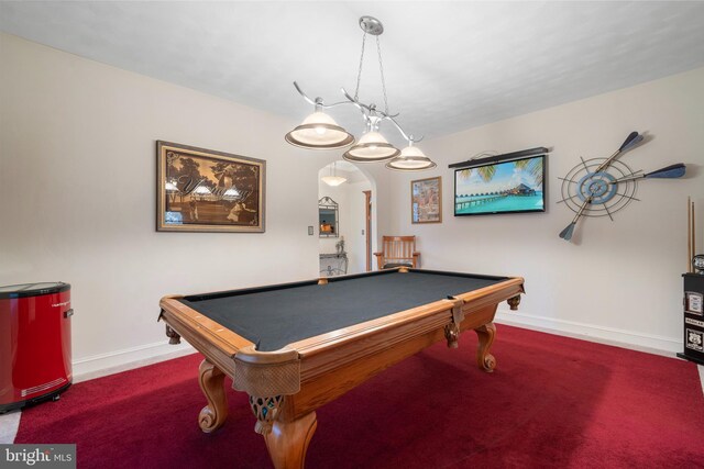 game room featuring arched walkways, baseboards, and billiards