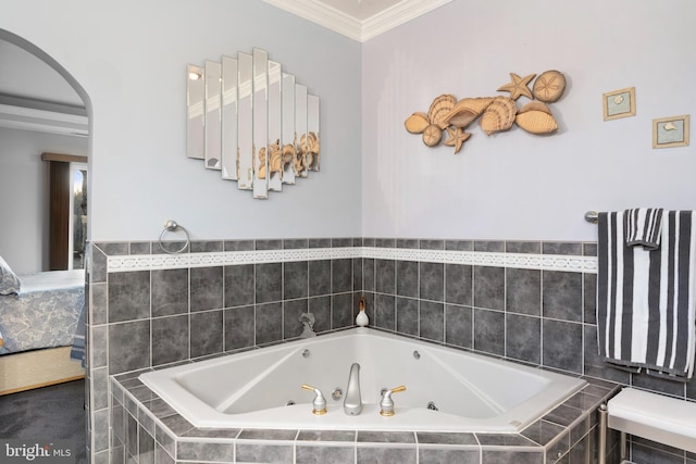 full bathroom featuring ensuite bath, crown molding, and a whirlpool tub