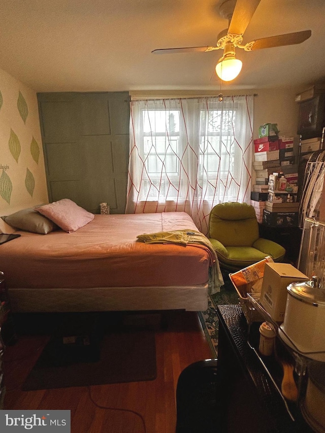 2834 Edgecombe Cir S, Baltimore, MD 21215 - bedroom with wood finished floors and a ceiling fan