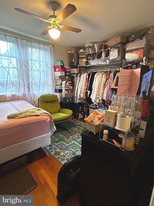2834 Edgecombe Cir S, Baltimore, MD 21215 - bedroom featuring wood finished floors and a ceiling fan