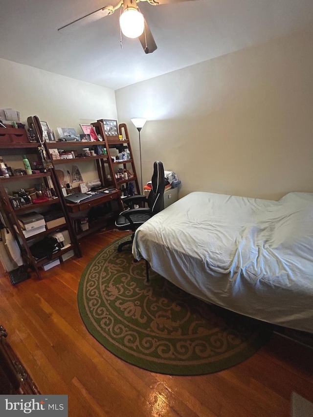 2834 Edgecombe Cir S, Baltimore, MD 21215 - bedroom with wood finished floors and ceiling fan