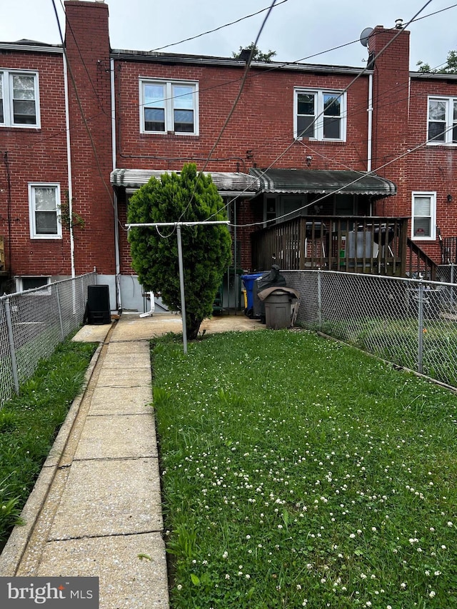 2834 Edgecombe Cir S, Baltimore, MD 21215 - back of house featuring brick siding