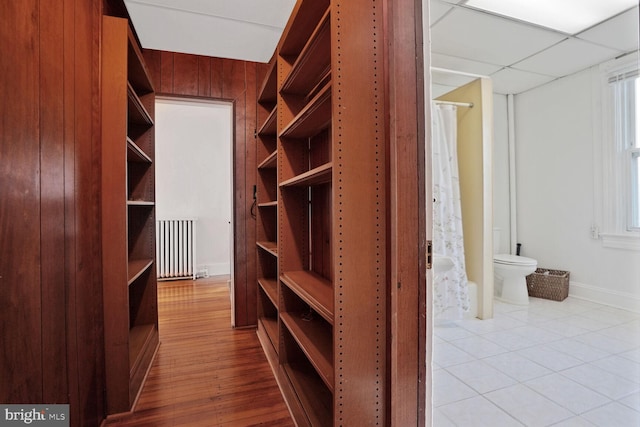 1033 Newton St NE, Washington, DC 20017 - walk in closet featuring radiator heating unit and light wood-style floors