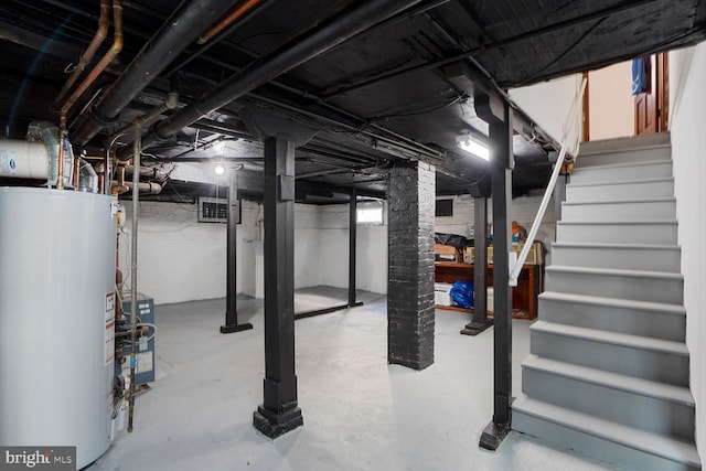 1033 Newton St NE, Washington, DC 20017 - below grade area featuring water heater, stairway, and a heating unit