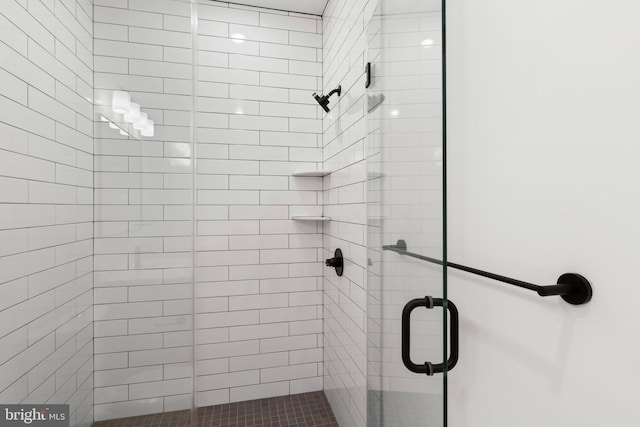 bathroom with a shower stall