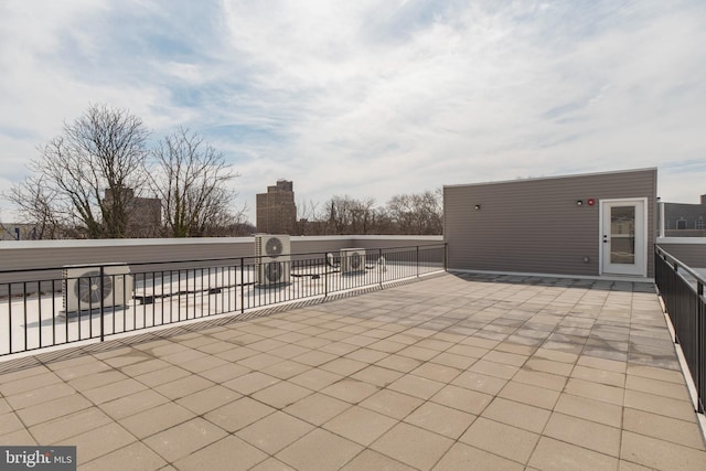 view of patio / terrace featuring fence