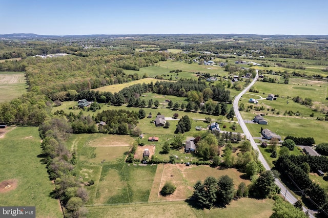 birds eye view of property featuring a rural view