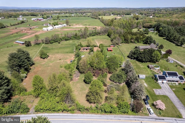 birds eye view of property featuring a rural view
