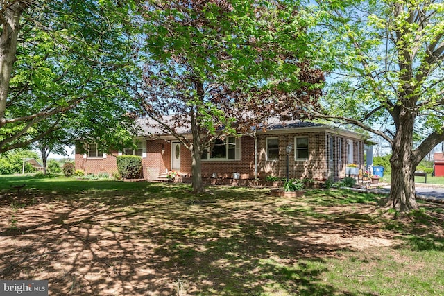 ranch-style home with brick siding
