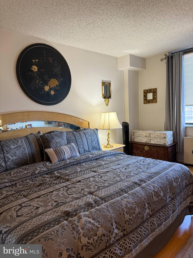 bedroom with a textured ceiling