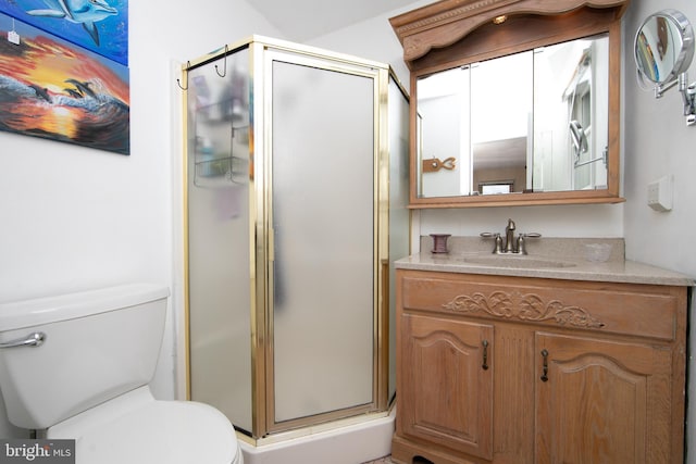 full bath with a shower stall, toilet, and vanity