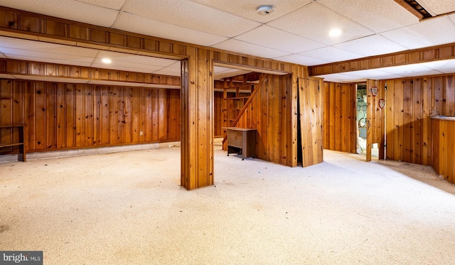 526 Baltimore Annapolis Blvd, Severna Park, MD 21146 - finished below grade area with a drop ceiling, carpet flooring, and wood walls