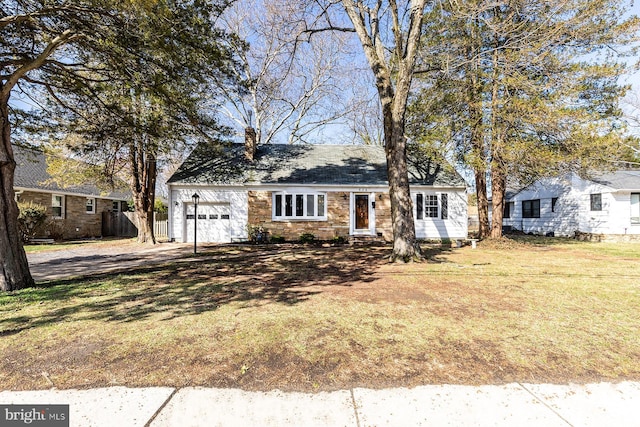 526 Baltimore Annapolis Blvd, Severna Park, MD 21146 - view of front facade featuring driveway, a front lawn, fence, an attached garage, and a chimney