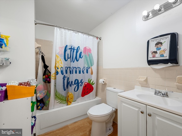 4137 Hedgesville Rd, Hedgesville, WV 25427 - bathroom with shower / tub combo, toilet, tile walls, vanity, and wood finished floors