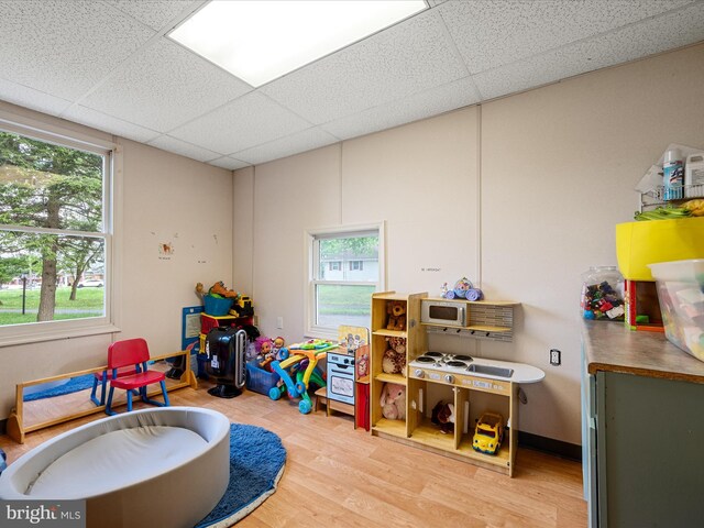 4137 Hedgesville Rd, Hedgesville, WV 25427 - recreation room with a paneled ceiling and wood finished floors