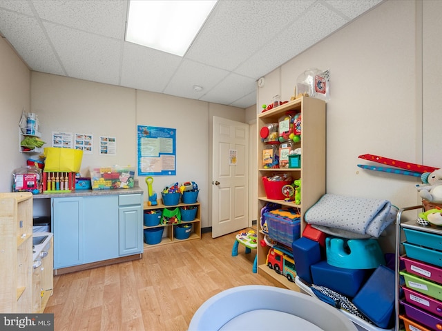 4137 Hedgesville Rd, Hedgesville, WV 25427 - playroom featuring a drop ceiling and light wood-style floors