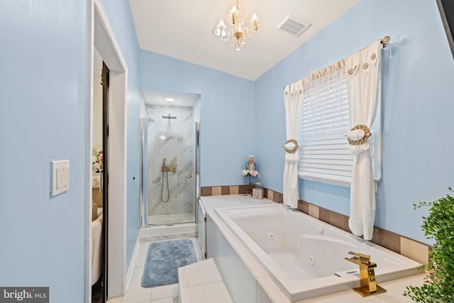 full bathroom featuring tile patterned floors, visible vents, a marble finish shower, a chandelier, and a whirlpool tub