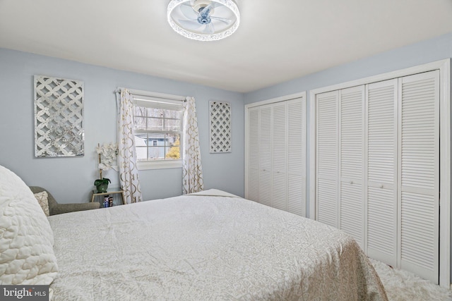 bedroom featuring two closets