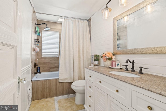 full bathroom with tile patterned flooring, toilet, vanity, and shower / bath combination with curtain