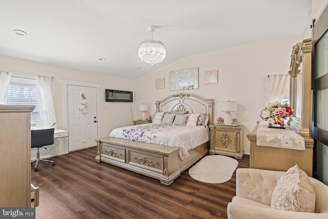 bedroom with lofted ceiling, a notable chandelier, wood finished floors, and a wall mounted AC