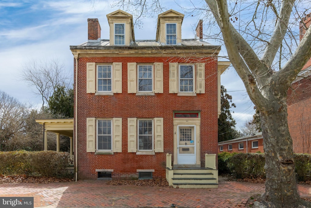97 W Broadway, Salem, NJ 08079 - view of front of property with brick siding, entry steps, and a chimney