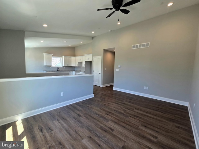 211 Greenland Beach Rd, Baltimore, MD 21226 - kitchen with visible vents, baseboards, recessed lighting, white cabinetry, and dark wood-type flooring