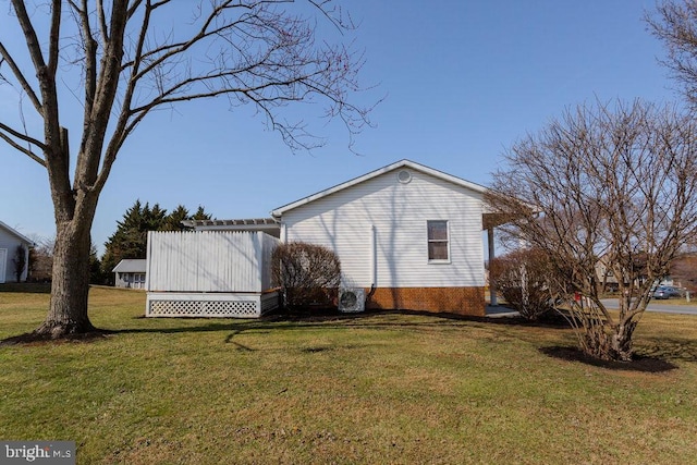 view of property exterior with a lawn