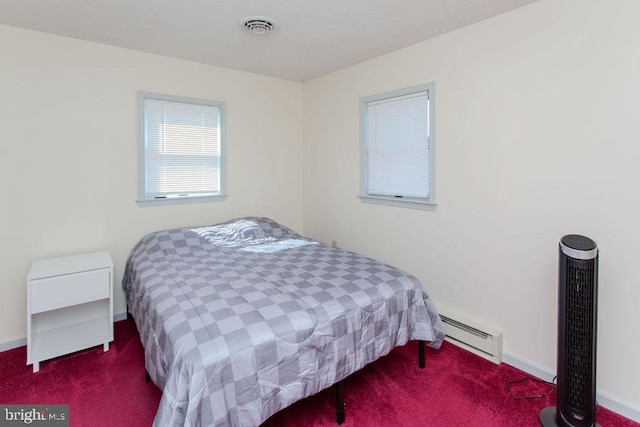bedroom with visible vents, a baseboard radiator, baseboards, and carpet floors
