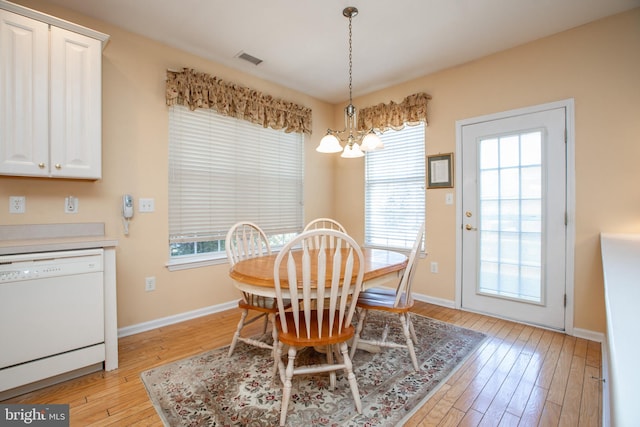 83 Huntington Dr, Jackson, NJ 08527 - dining room featuring a notable chandelier, baseboards, light wood-style floors, and visible vents