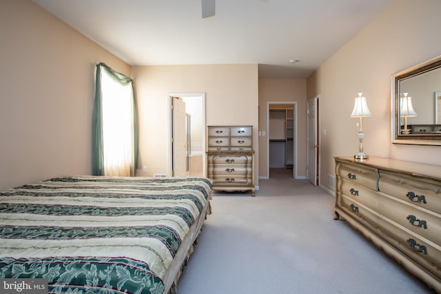 83 Huntington Dr, Jackson, NJ 08527 - carpeted bedroom with a spacious closet, visible vents, baseboards, ensuite bathroom, and a ceiling fan