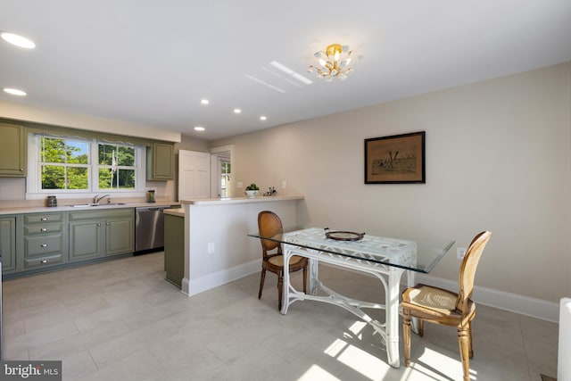dining space with baseboards, recessed lighting, and a chandelier