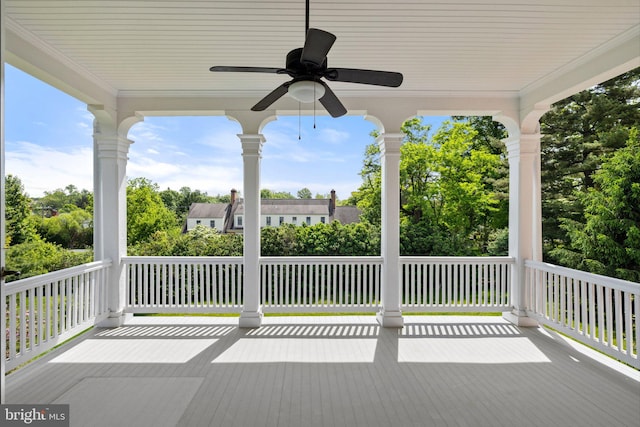 wooden terrace with ceiling fan