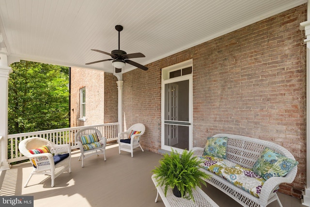 view of patio featuring ceiling fan