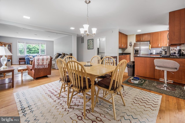 211 N Huron Dr, Oxon Hill, MD 20745 - dining area featuring light wood-style floors, a chandelier, and recessed lighting