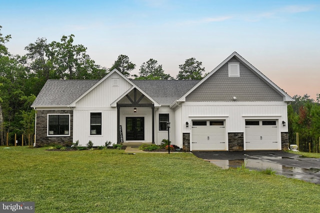 19103 Windsor, Drayden, MD 20630 - modern farmhouse with stone siding, a garage, driveway, and a front yard