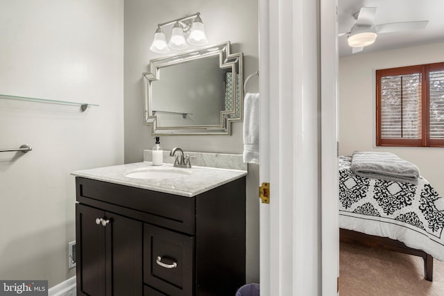 ensuite bathroom featuring ensuite bath and vanity