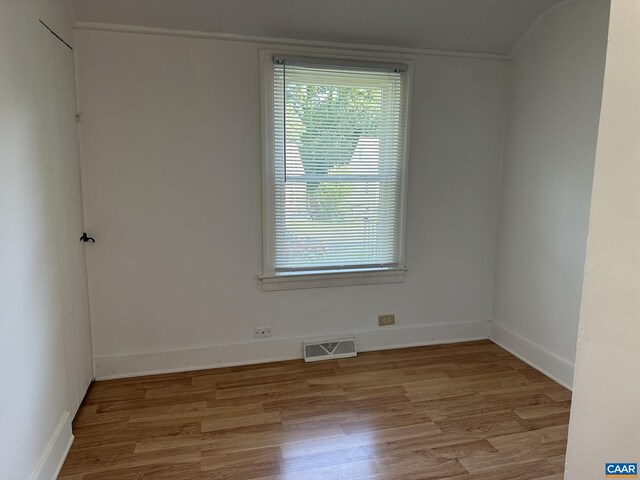 1616 Mulberry Ave, Charlottesville, VA 22903 - empty room featuring visible vents, baseboards, and light wood-style floors