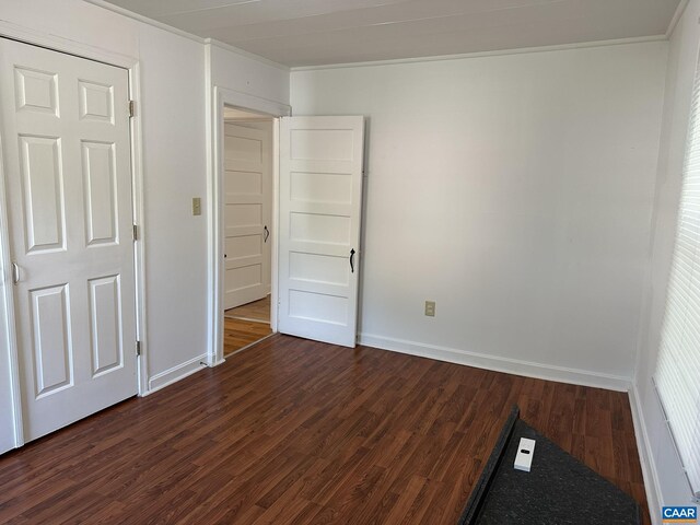 1616 Mulberry Ave, Charlottesville, VA 22903 - unfurnished bedroom featuring dark wood-style floors, baseboards, and ornamental molding