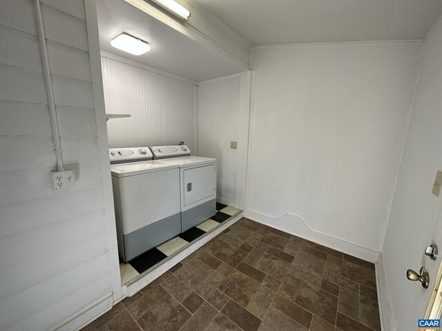 1616 Mulberry Ave, Charlottesville, VA 22903 - washroom featuring stone finish floor, laundry area, and washer and clothes dryer