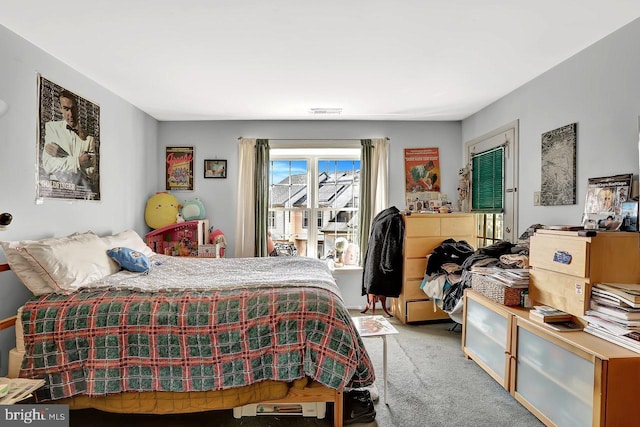 carpeted bedroom with visible vents